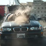 Car being smashed by a wrecking ball